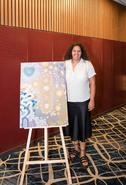 Lismore artist Tywana Caldwell with artwork Reconcile Connection. Picture supplied