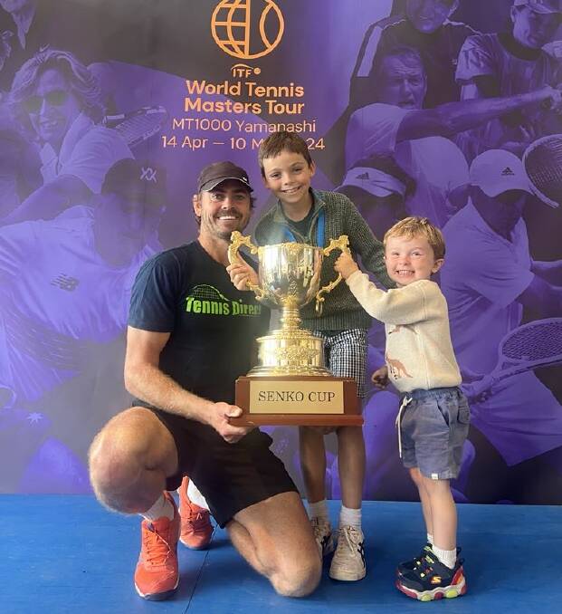 Lismore tennis product Brendon Moore with his sons Hunter, 8 and Archie, 3, after winning the over-35 masters tennis tournament in Japan. Picture supplied.