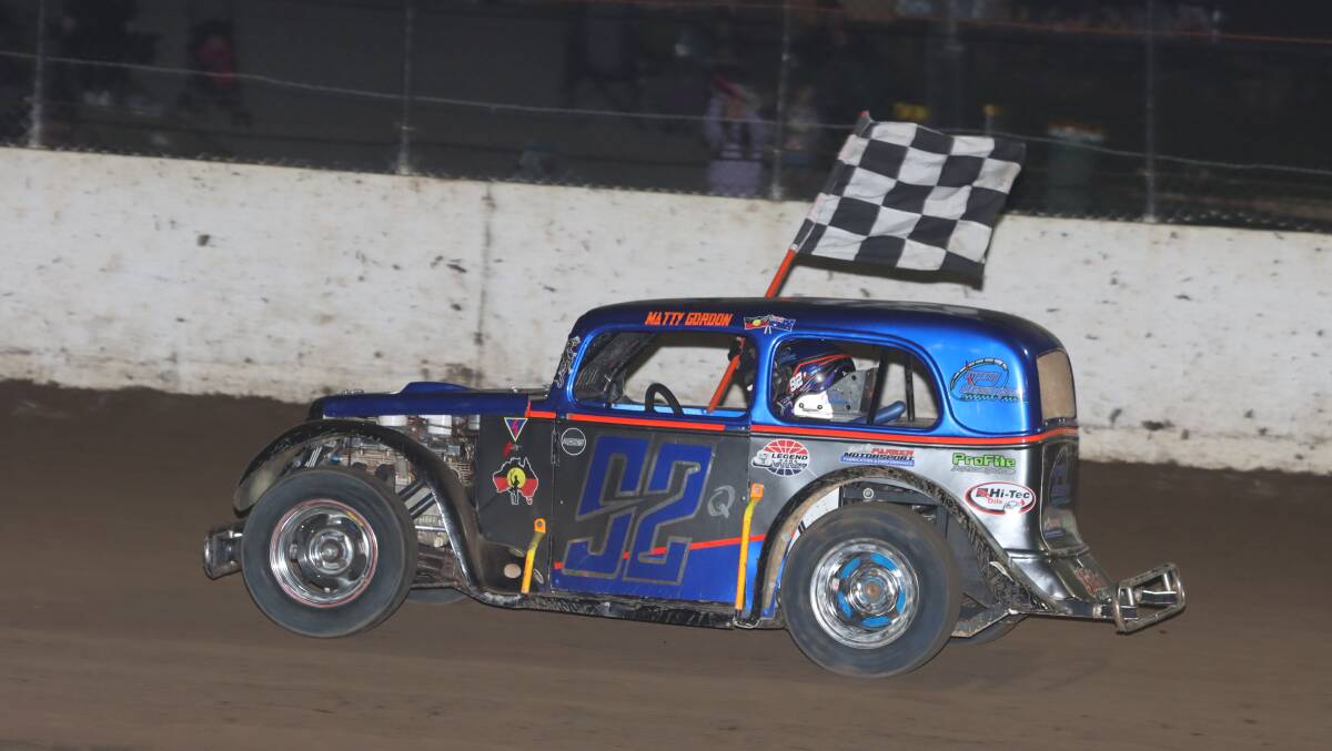 Matt Gordon takes his lap of honour after winning the 2024 Australian Legend Cars
Championship at Castrol Lismore Speedway. Picture by Tony Powell.