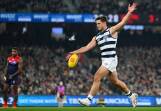 Tom Hawkins of the Geelong Cats has a shot at goal during the match with Melbourne at the MCG. (Morgan Hancock/AAP PHOTOS)